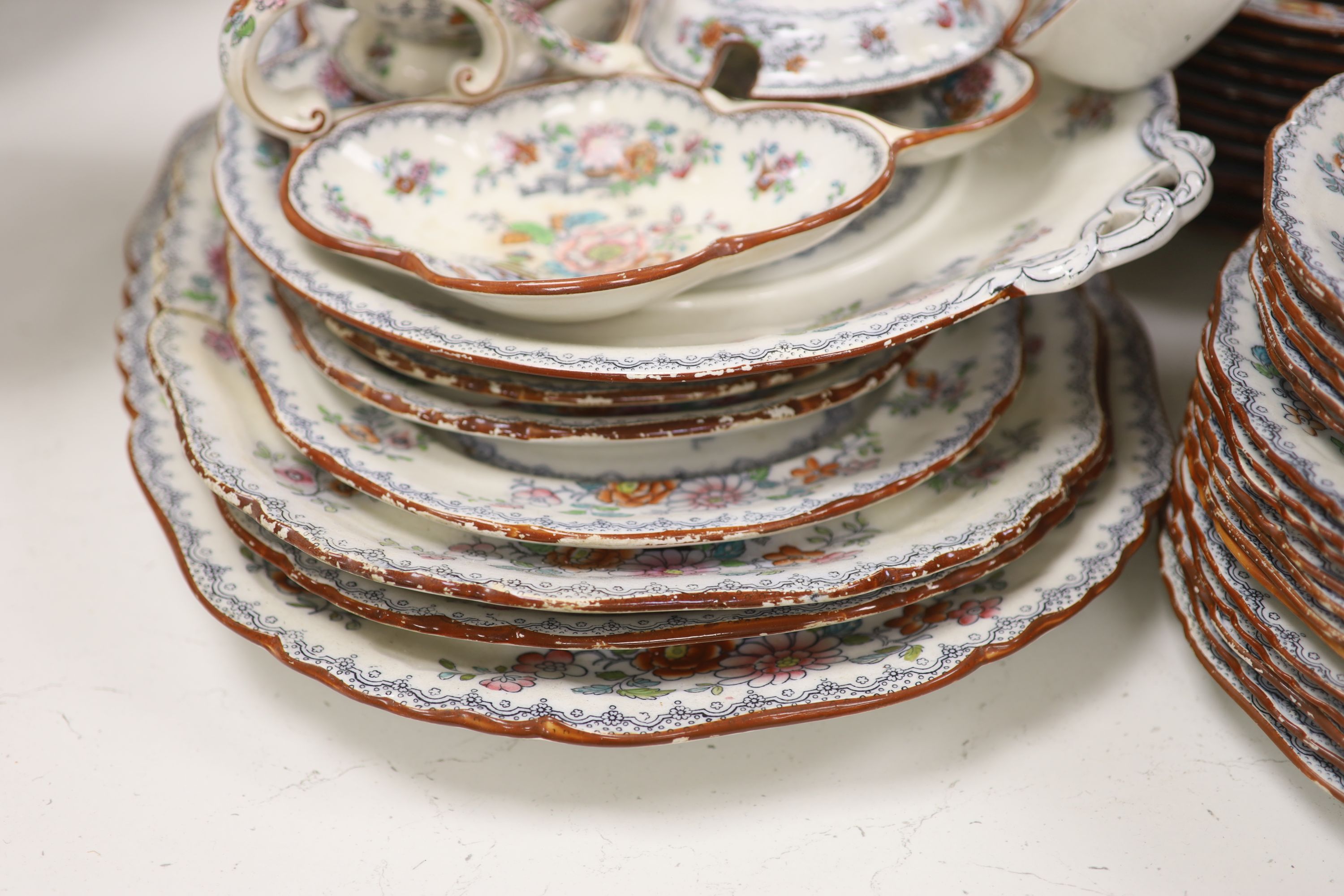 A Victorian Ashworth ironstone part dinner service